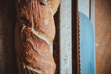 Artisanal bread stick on wood table