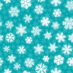 Christmas seamless pattern of white snowflakes of different shapes on turquoise background