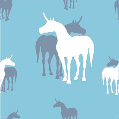 colorful silhouettes of unicorns on a colored background