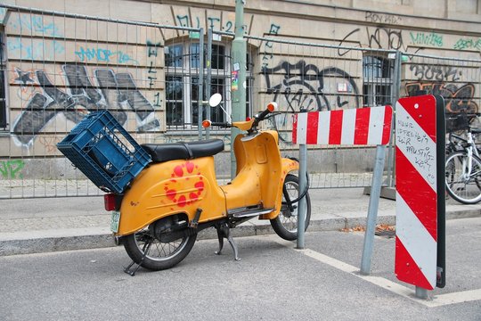 BERLIN, GERMANY - AUGUST 25, 2014: Simson Schwalbe oldtimer scooter parked in Berlin. More than 900 thousand were produced in 1959-1986.
