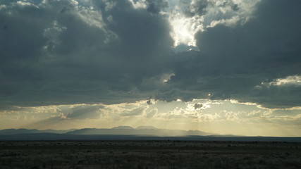 Obraz na płótnie Canvas Epic clouds over western landscape