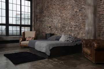 Interior of the bedroom in a loft