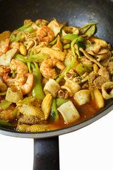 Stir fried Spicy curry with Shrimp, squid and pork.