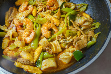 Stir fried Spicy curry with Shrimp, squid and pork.