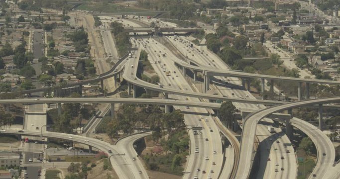 Aerial shot, day, clear view of major la highway interchange, drone