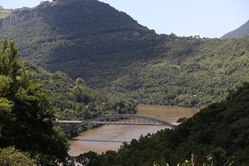 Fototapeta na wymiar Aerial view of a bridge over the Antas River in South brazil