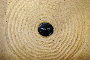 Fototapeta na wymiar clarity rock on sand - very zen