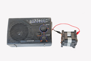 Obraz premium The old transistor radio, backup battery, Lithium phosphate battery power bank,DIY by yourself on the white background.