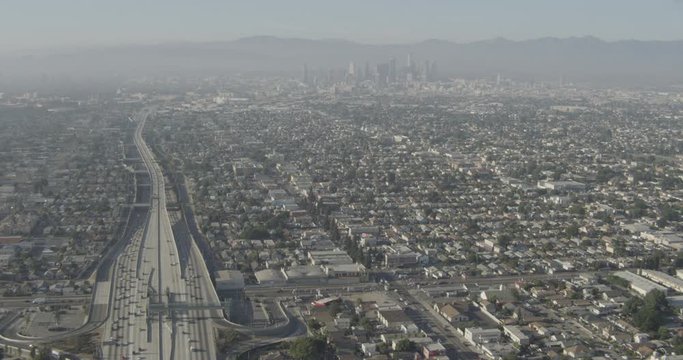 Aerial shot, day, high altitude view of la sprawl and highway, drone