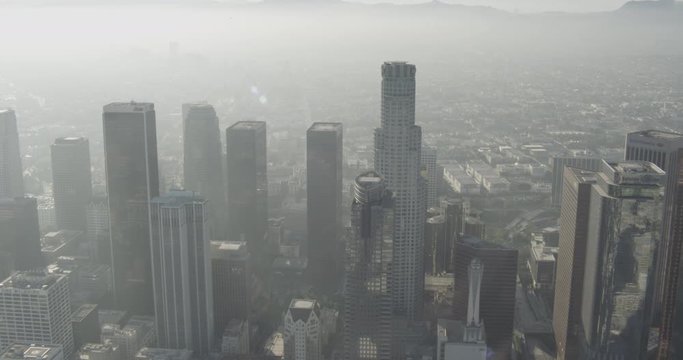 Aerial shot, day, hazy panoramic view of downtown la skyscrapers, drone