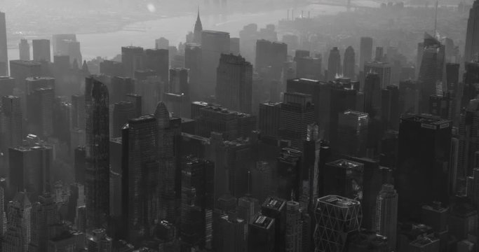 Black and white aerial shot, great slow expose of midtown NYC, drone
