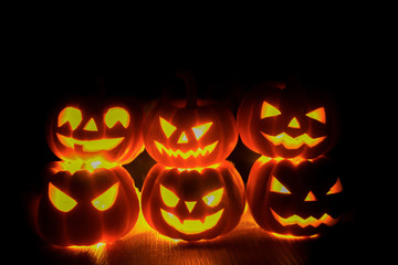 Halloween background. happy stacking of Spooky pumpkin n dark background