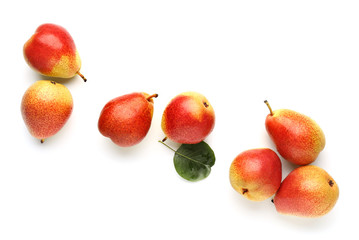 Sweet ripe pears on white background