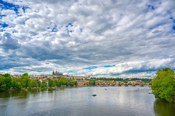 Naklejka premium A view of Prague Castle across the Vltava River in Prague, Czech Republic.