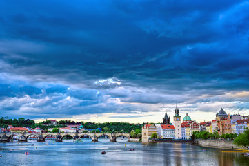 A view of Old Town Prague and the Charles Bridge across the Vltava River in Prague, Czech Republic.