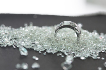 Close up of diamond ring on jewelry background, platinum ring on diamond.