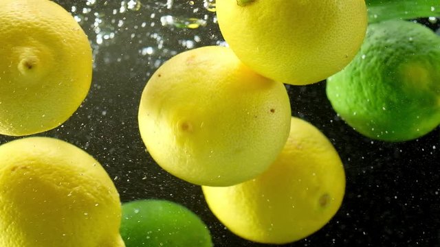 Dropping Lemon and Lime into fresh water