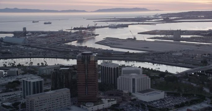 Aerial shot, low light, pan examination of downtown Long Beach, drone