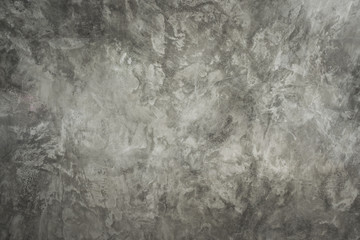 Fototapeta premium Gray loft cement wall background with empty and well use montage display products or text present on free space