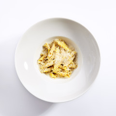 Delicious penne with cheese and truffle oil top view