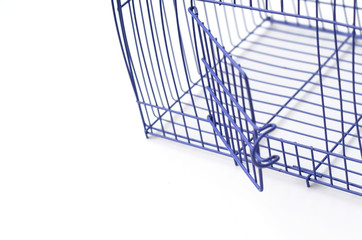 Purple pet cage opened the cage door.