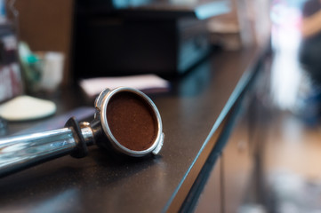 Coffee powder on coffee tamper