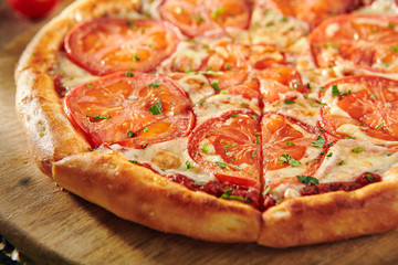 Pizza Restaurant Menu - Delicious Fresh Margarita Pizza with. Pizza on Rustic Wooden Table with Ingredients