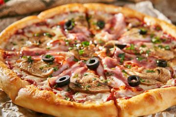 Pizza Restaurant Menu - Delicious Fresh Pizza with Bacon and Mushrooms. Pizza on Rustic Wooden...