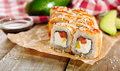 Salmon and Smoked Eel Sushi Roll with Pickled Daikon