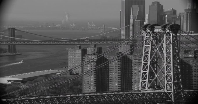  Helicopter aerial sclose up of bridge over Hudson River, black and white, drone