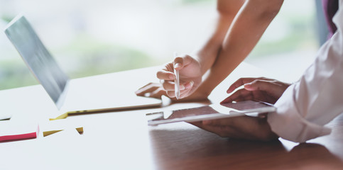 Cropped view of professional male UX web designer working on his new smartphone templates