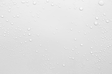 Water droplets on a gray background - obrazy, fototapety, plakaty