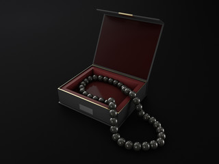 3d Illustration of open wood jewelry box with black pearls