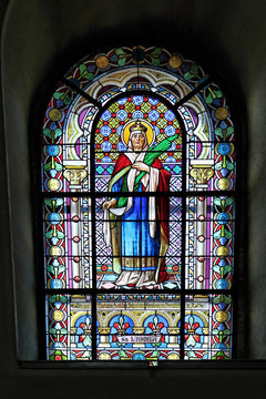 Colorful church window with image of Saint Ludmila