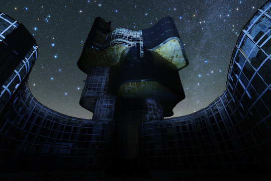 Stars and constellations over an abandoned monument