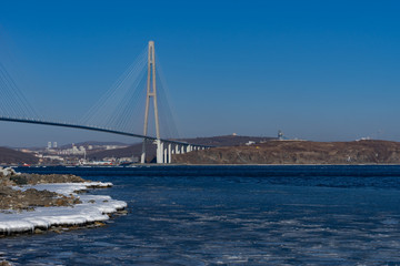 Russian bridge against the blue sky.