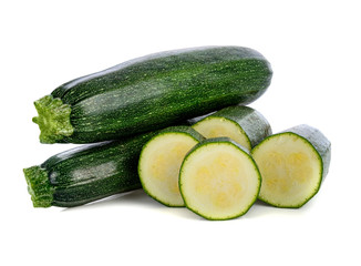 fresh green zucchini with slice isolated on white background