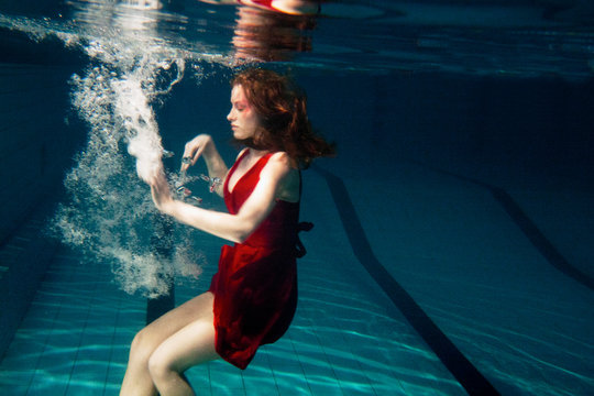 underwater portrait of woman out of reality