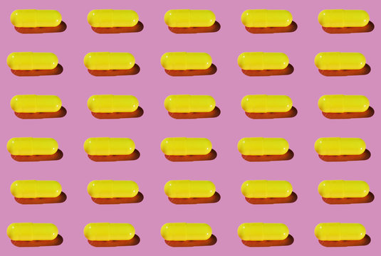 Yellow Pharma Pill Pattern on Pastel Pink