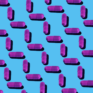 Purple Pharma Pill Pattern on Pastel Blue
