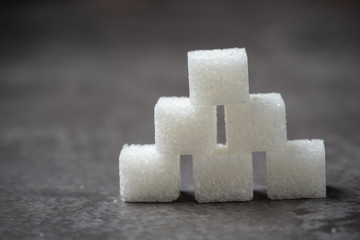 white Sugar cube on table.