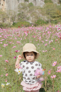 Little girl in a flower field