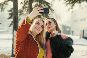 Girls Taking Selfie With Phone Camera