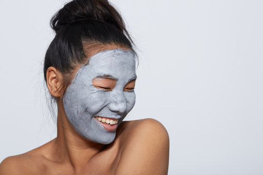 Smiling skincare woman portrait with eyes closed