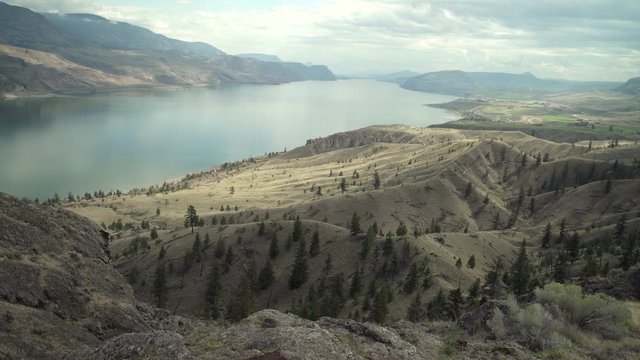 Kamloops Lake British Columbia 4K UHD. Dramatic clouds at sunset over Kamloops Lake. 4K UHD.