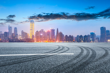 Fototapeta premium Empty asphalt road and Chongqing night cityscape