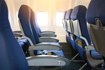 Empty airplane seats in the cabin