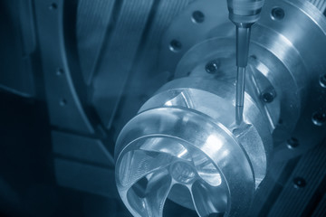 The  5-axis CNC milling machine  cutting the hi-precision automotive  by solid ball endmill tools. The hi technology of impeller parts manufacturing process by 5-axis machining center.