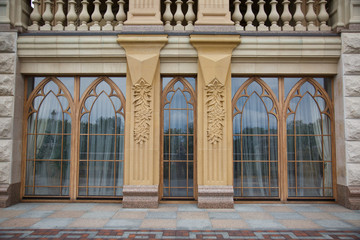 Vintage window with arch. Architecture elements of old town. Castle style. Arched windows