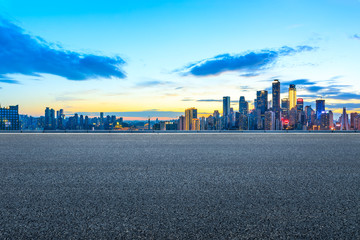 Empty asphalt road and Chongqing night cityscape